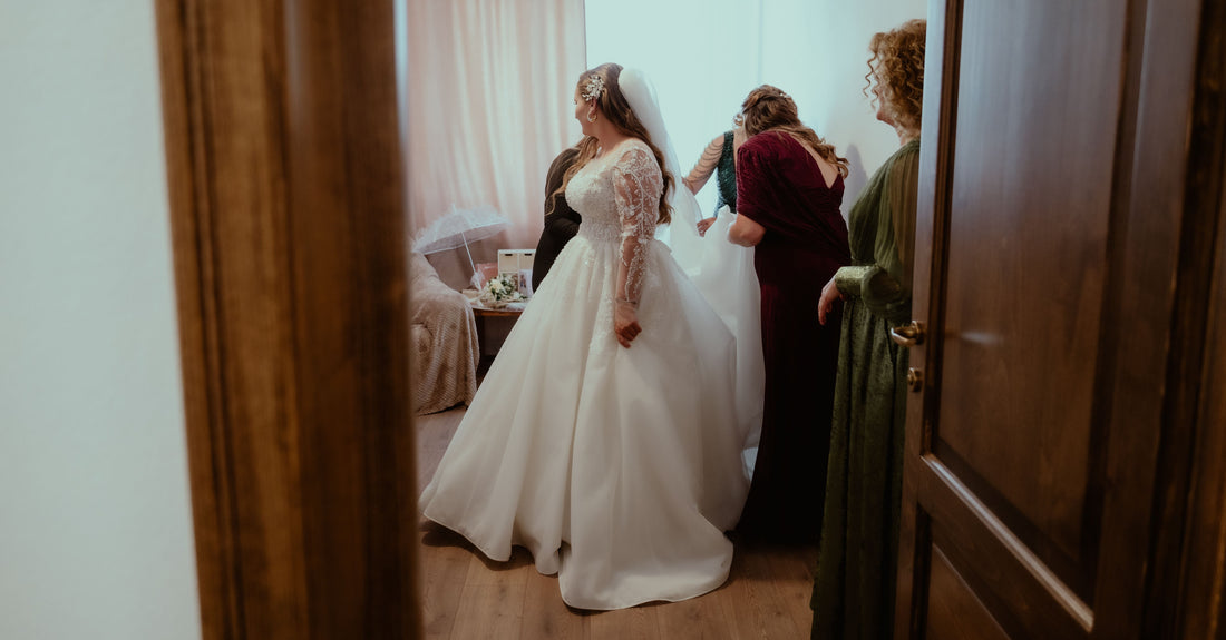 Discover who helps the bride get dressed on her wedding day, why a professional Bridal Dresser is becoming essential