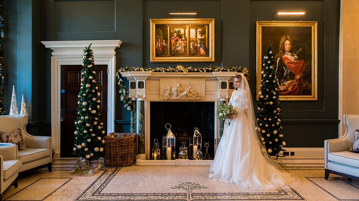 Luxury winter wedding dress prepared in a London hotel bridal suite for a Christmas wedding.