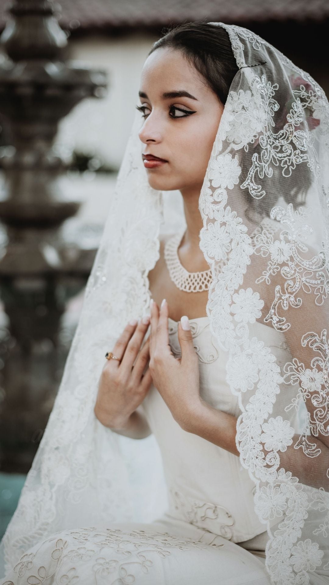 bride wearing veil and 2 corset wedding dress - service used Veil and Dress Steaming. www.silversilverbridaldresser.co.uk, image by Tim Mossholder